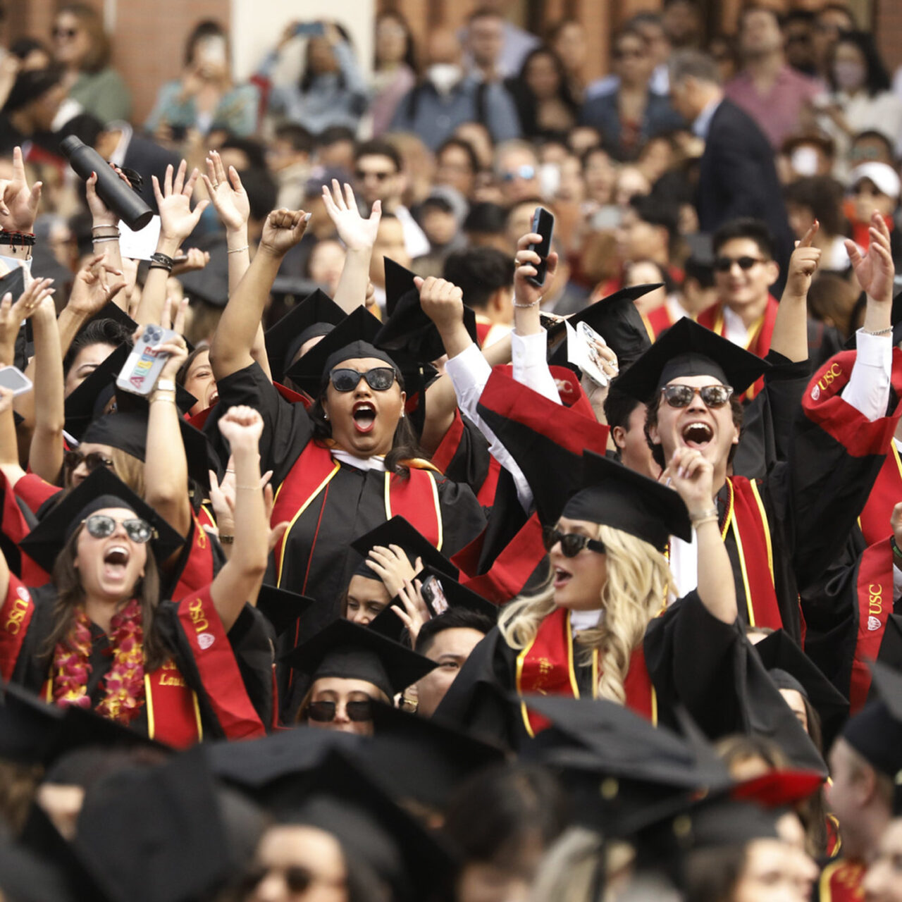 Students cheering at commencement ceremony