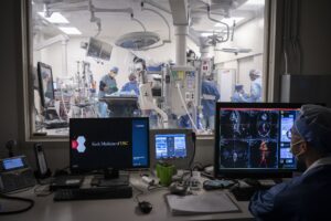 Sukgu Han, Chief of the Division of Vascular Surgery, in the OR