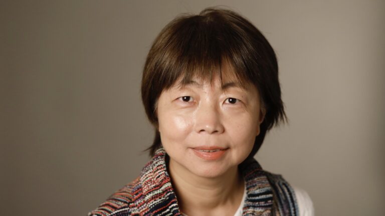 Photo shows molecular biologist Yali Dou, PhD, from the Keck School of Medicine of USC.