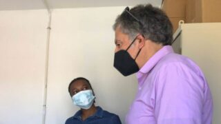 scientists talk in masks