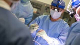 Surgeon-scientist performs in the OR