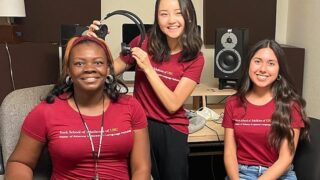 Speech langage pathology students working with sound equipment