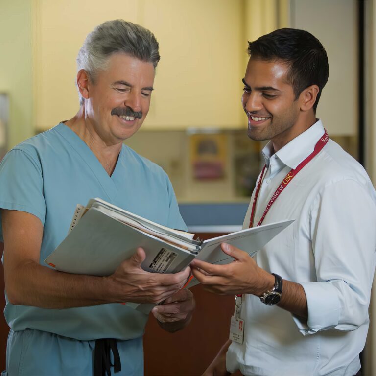doctors looking over notebook