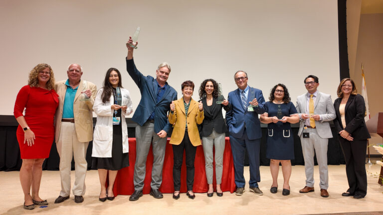 Group photo with awards