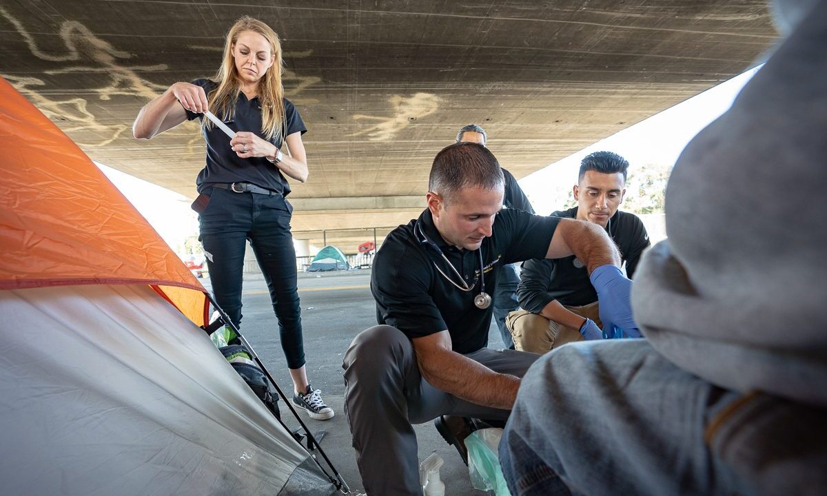 A team from Keck Medicine of USC administer care to the unhoused.