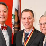 Dr. Dean Eliott (center) receives the Narsing A. Rao, MD Endowed Lecture Award from Drs. J. Martin Heur (left) and Narsing Rao (right). (Photo/Filgraphix)