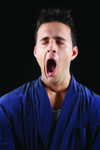 Man yawning --- Image by © Kate&Camilla/Corbis