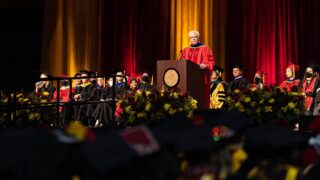 Dextor Holland, USC PhD graduate and lead singer of the Offspring, delivers commencement speech at Galen Center.