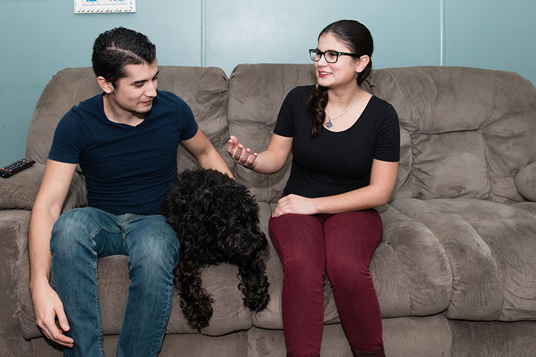Rosemary Navarro’s 22-year-old son, Ricardo, and her 19-year-old daughter, Lizeth, live with her in a three-bedroom trailer in La Habra, California. They depend heavily on her, both emotionally and financially. (Heidi de Marco/KHN)