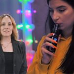 Researcher in front of a teen vaping