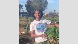 smiling person in garden