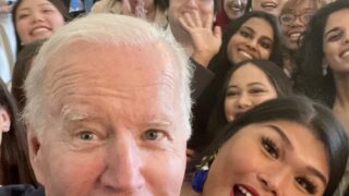 students with President Biden