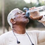 man drinking water