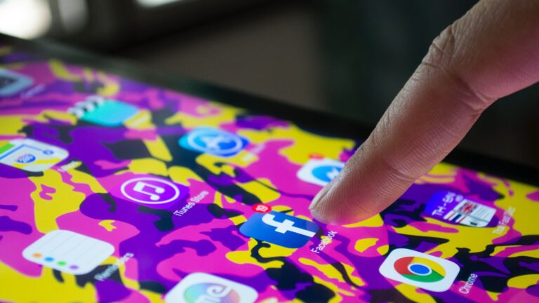 pressing facebook app on phone