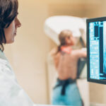 Patient getting checked for breast cancer.
