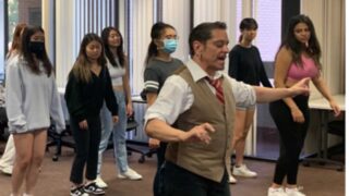 college dance professor teaching class