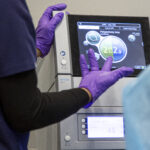Colorectal fellows get a demonstration of new surgical technology