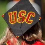 Commencement cap with beads spelling USC