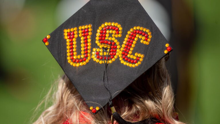 Commencement cap with beads spelling USC