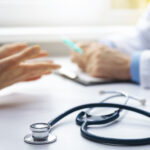 Patient talking to doctor