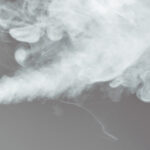 Person exhaling smoke