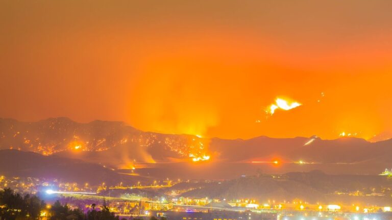 Photo shows Night long exposure photograph of the Santa Clarita wildfire
