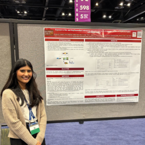 researcher with scientific poster