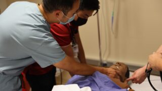 Resident receives training in a skills lab