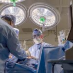 Vaughn Starnes performing a cardiovascular surgery.