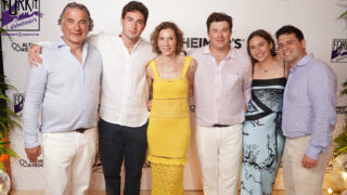 The photo shows the Simon family: : Irwin Simon, Lucas Simon, Daryl Simon, Trevor Simon, Nicolette Simon, Matt Sandberg