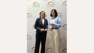 Shuwan Liu poses with trophy