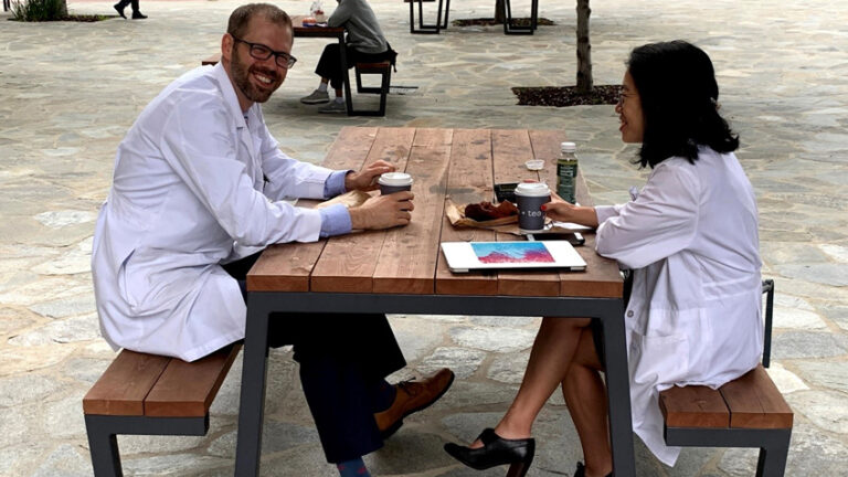 Faculty mentoring resident.
