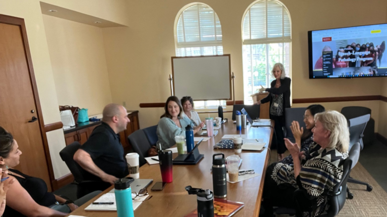 MS SLP program director and faculty in a meeting.