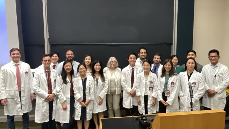 Residents and Dr. Lori Eisenberg, Ph.D. at the annual resident research symposium.