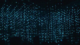 Blue dots on a black background