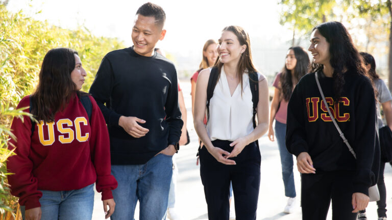 diverse group of students walking