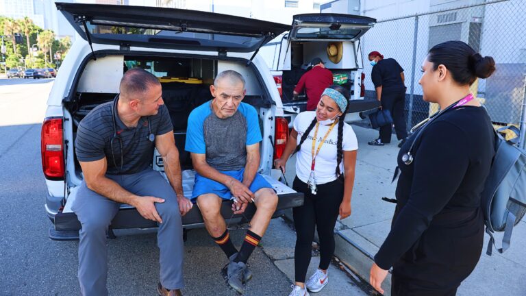 USC Street medicine staff and client