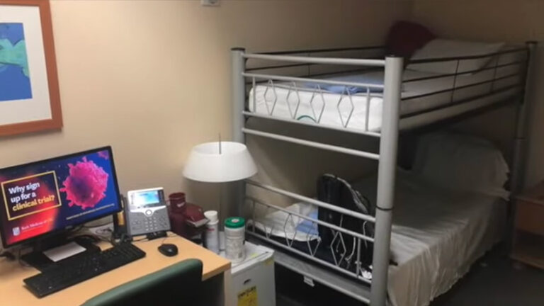 Cardiothoracic Residency on-call quarters shows a desk with a computer and two bunk beds