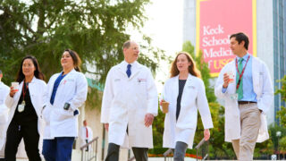Dr. Lieberman and othopaedic faculty walking across campus