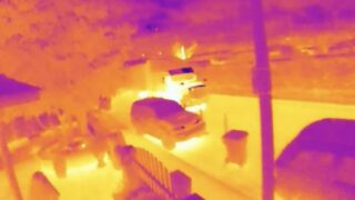 Infrared image of a truck giving off heat