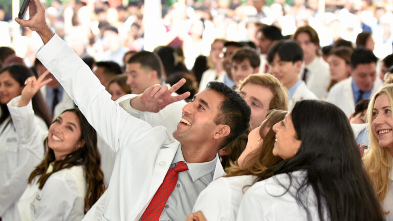 Keck School students at white coat ceremony taking a selfie
